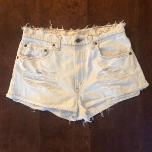 White ripped Levi shorts